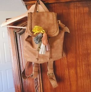 Brown bag with tassels